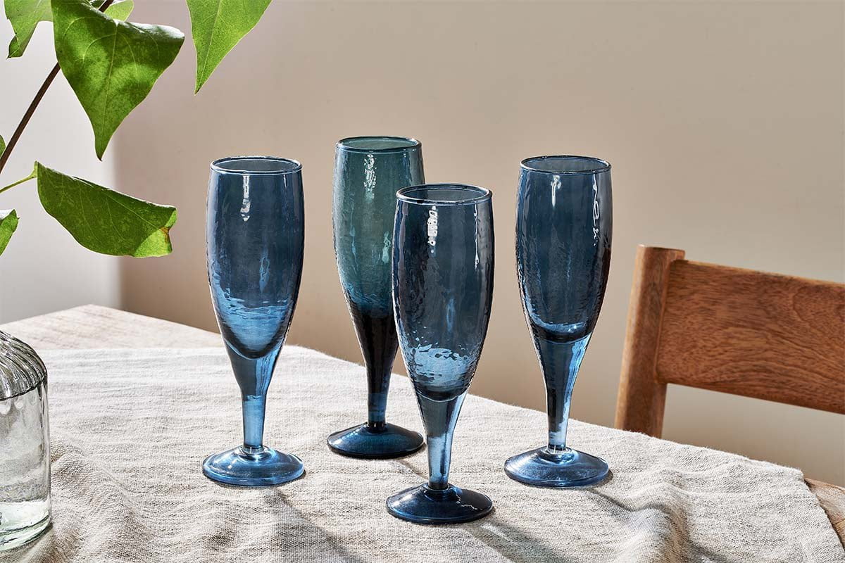 http://www.nkuku.com/cdn/shop/products/nkuku-yala-hammered-champagne-glass-indigo-set-of-4-5055672404835-31649831387312_1200x1200.jpg?v=1654088272