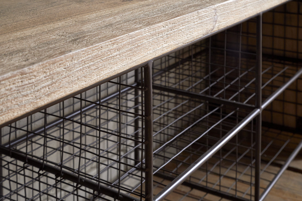 Close-up of the nkuku Abha Reclaimed Wood & Iron Storage Bench - Natural, highlighting the textured wood tabletop and the metal grid shelves beneath, ideal for use as a shoe storage bench or entryway organizer.