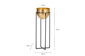 The Atsu Brass Planter Stand by nkuku features a large brass bowl in a minimalist black stand. Its square base is 28cm, height 79cm, and bowl depth 28cm—ideal for stylish planting. Displayed on a white background.