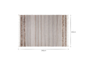 The nkuku Aadita Jute & Wool Rug - Grey is rectangular with fringed edges, subtle vertical stripes, and darker patterned side bands. It measures 240 cm wide by 150 cm tall, as shown by labeled arrows along the rug’s edges.