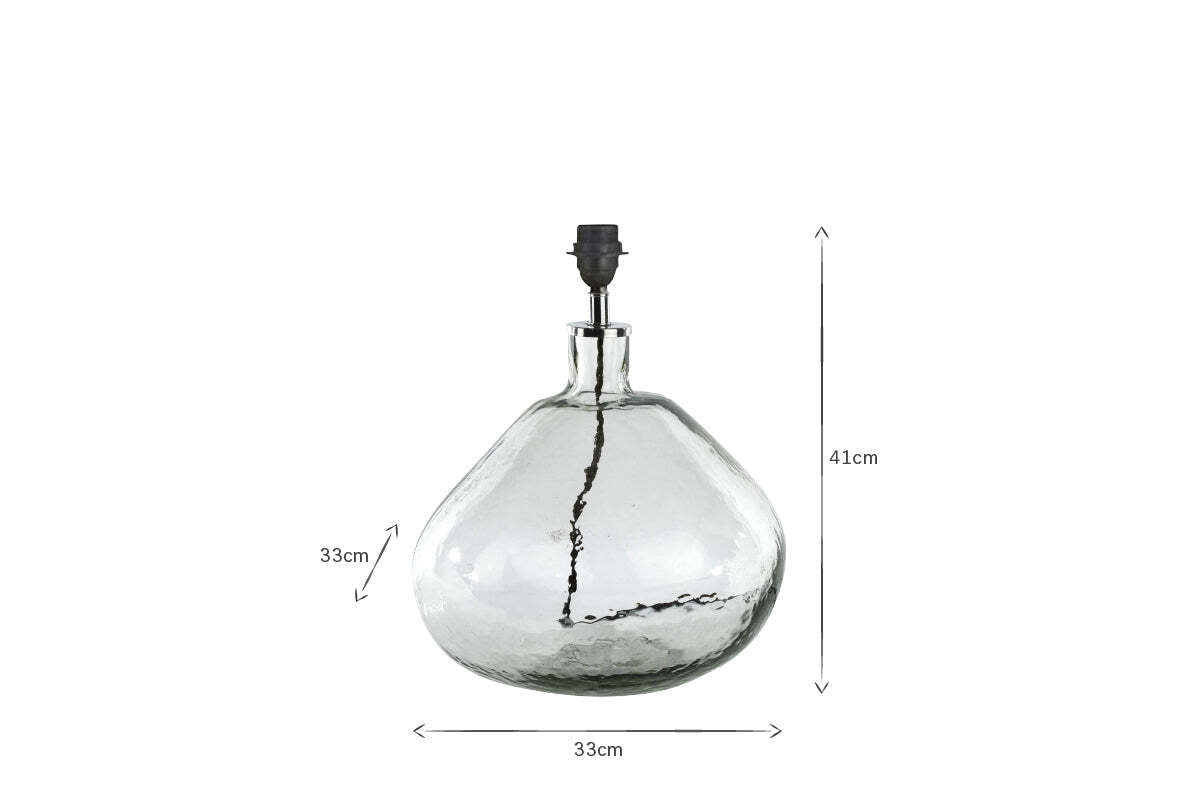 The nkuku Baba Recycled Glass Lamp - Clear - Large Wide features hand-blown, textured glass with a wide base and narrow neck, a black holder, and measures 41 cm tall by 33 cm wide and deep (dimensions shown by arrows).
