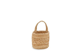 The Chapad Hemp Wide Wall Hung Basket by nkuku is a small, round, braided hemp basket with a sturdy handle. Made from natural light brown fibers, it’s ideal for kitchen storage or as decorative hanging wall art.