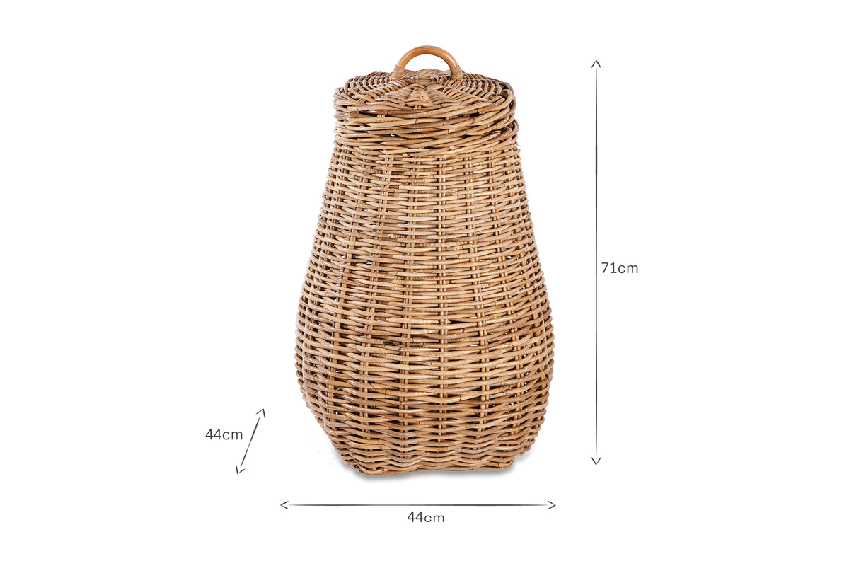 The nkuku Amandi Rattan Laundry Bin, shown on a white background with arrows and dimension labels, is a tall, light brown woven basket with a lid and handle, measuring 71cm high by 44cm wide—perfect for bathroom storage.