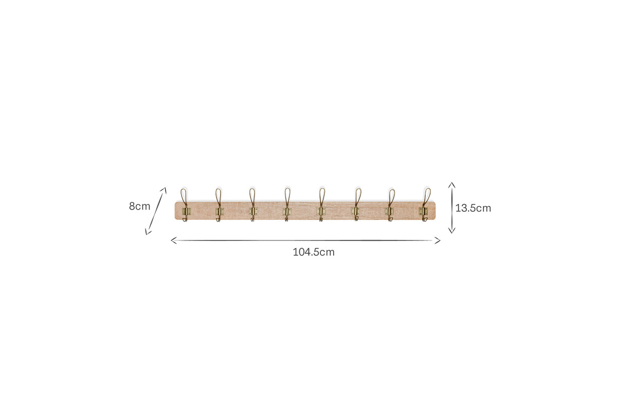 The nkuku Ankita Mango Wood & Iron Hooks - Natural & Antique Brass - Large is a light wood wall-mounted coat rack with eight artisan hooks, measuring 104.5cm long, 13.5cm tall, and hooks extending 8cm.