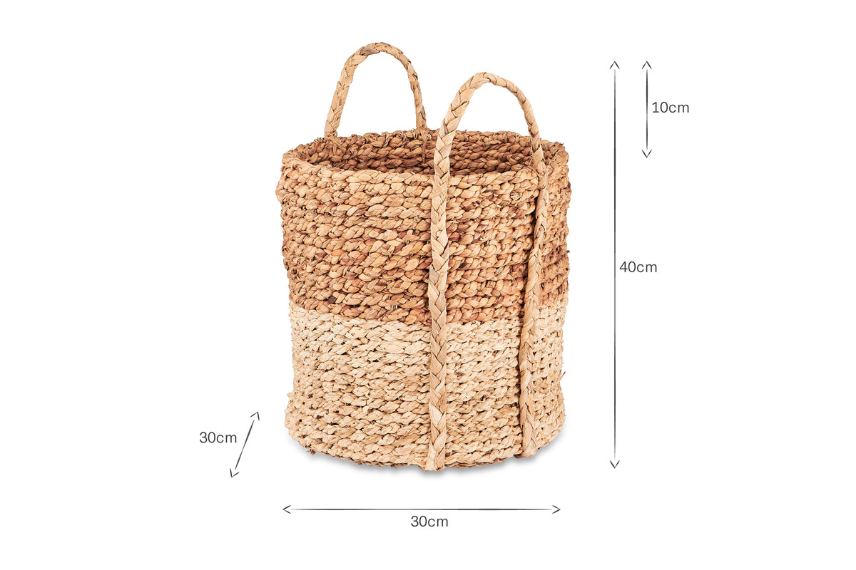 The nkuku Nkomi Basket is a woven, two-tone storage basket with handles, measuring 40cm tall. Inspired by traditional Nkomi baskets, it features a medium brown top and light beige bottom. Handles extend 10cm above the rim.