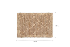 The Vandi Jute Doormat - Natural by nkuku features a subtle woven diamond pattern in brown fibers. Black text on a white background shows its size: 90cm wide by 60cm tall, highlighted by two arrows.