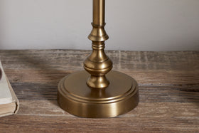 A close-up of the Ehadi Antique Table Lamp in antique brass by nkuku.