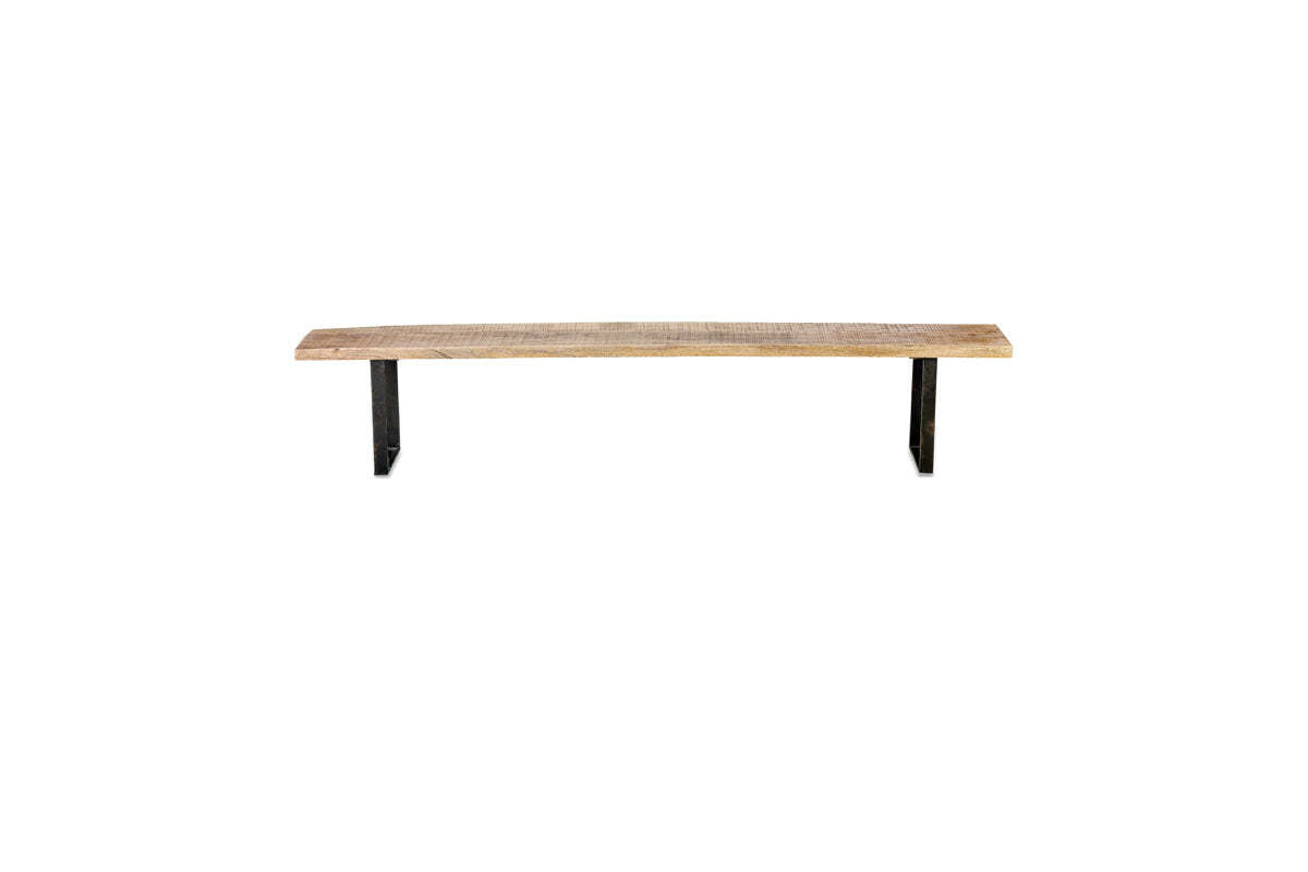 The nkuku Fia Bench features a minimalist, functional design with a natural light brown mango wood seat and two black angular legs at each end, shown against a plain white background.