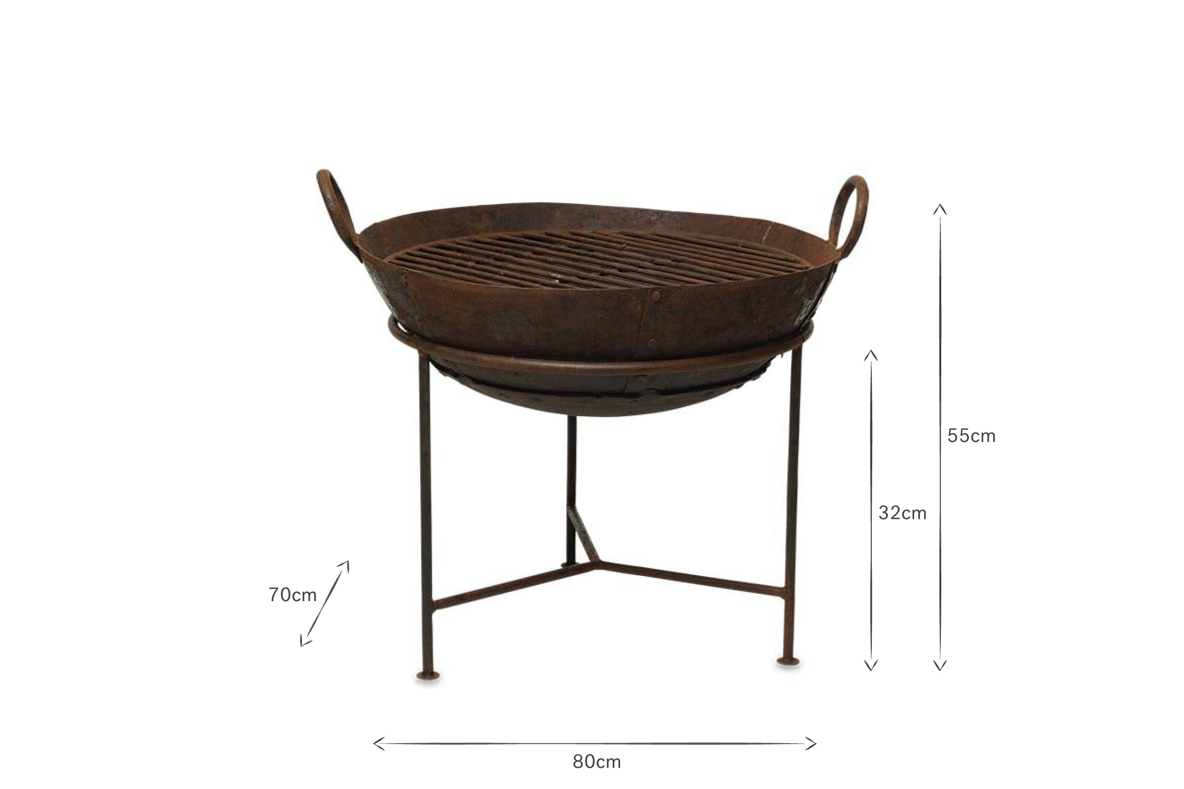 The nkuku Reclaimed Iron Kadai With Grill - Medium features a rustic, weathered brown finish, grated top, two side handles, and tripod stand. Dimensions: 80cm wide, 32cm bowl height, total height 55cm. Perfect as a classic outdoor fire pit barbecue.