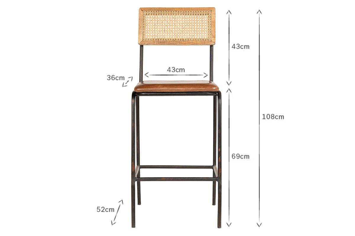 The Iswa Leather & Cane Counter Chair by nkuku features an aged tan finish, woven cane back, wooden seat, and black metal legs. Dimensions: seat 43x36cm, backrest 43cm, seat height 69cm, total height 108cm, base width 52cm.