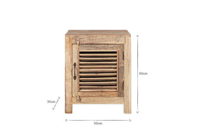 The nkuku Ibo Reclaimed Wooden Slatted Cabinet – Natural - Small features a single slatted door, black metal handle, and four short legs. Handcrafted in India, it measures 60cm high, 50cm wide, and 35cm deep against a plain white background.