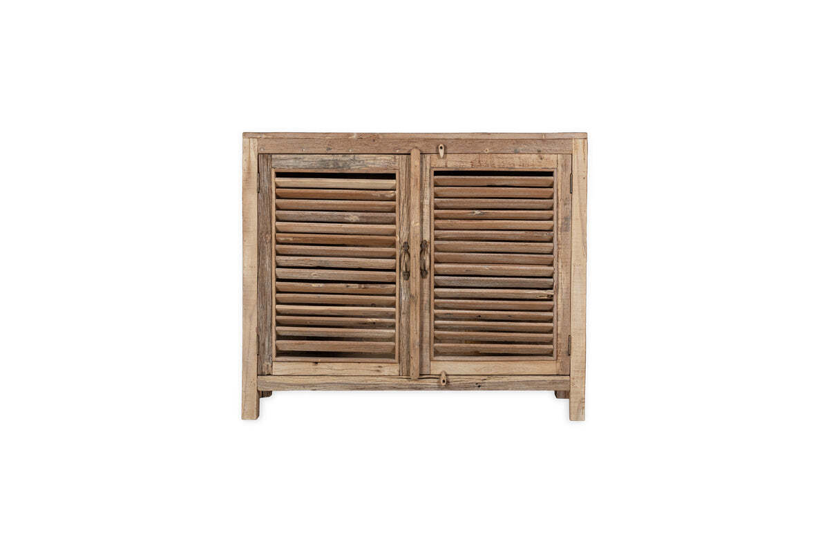 The nkuku Ibo Reclaimed Wooden Slatted Sideboard - Natural features two slatted doors, visible grain, and a weathered finish. Crafted by Indian artisans, its farmhouse style and four short legs stand out against a plain white background.
