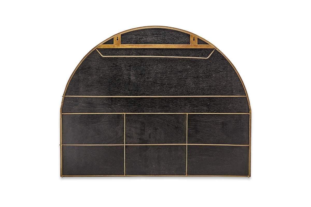 The nkuku Imoma Iron Overmantel Arch Mirror in brass features a black arched frame, gold trim, and six rectangular compartments divided by thin gold lines, reminiscent of elegant wall organizers.