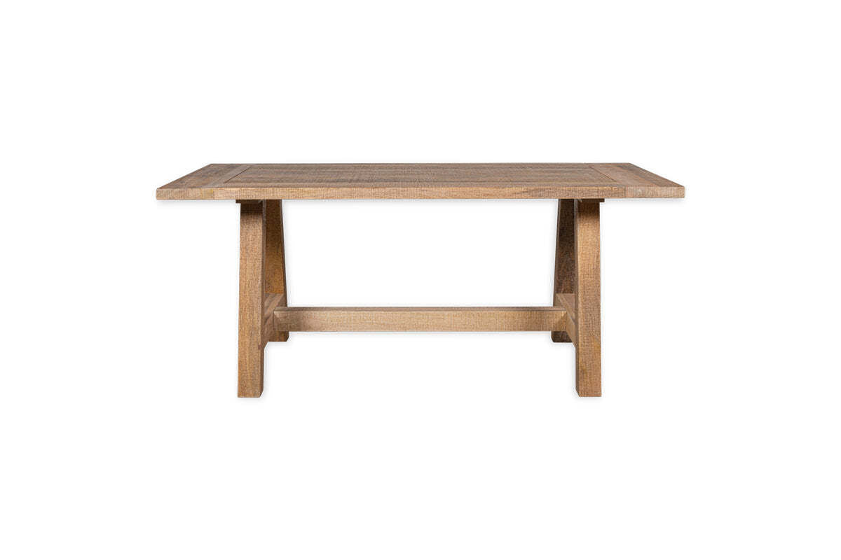 The nkuku Indali Mango Wood Dining Table - Natural features a rectangular, weathered mango wood top and sturdy tapered legs with a lower stretcher—an ideal sustainable choice for cozy spaces.