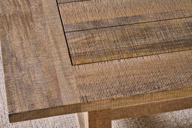 Close-up of the nkuku Indali Mango Wood Dining Table - Natural, featuring a rectangular inlay design. The visible grain and natural imperfections add character, perfect for small spaces and highlighted by lighting on a light woven rug.