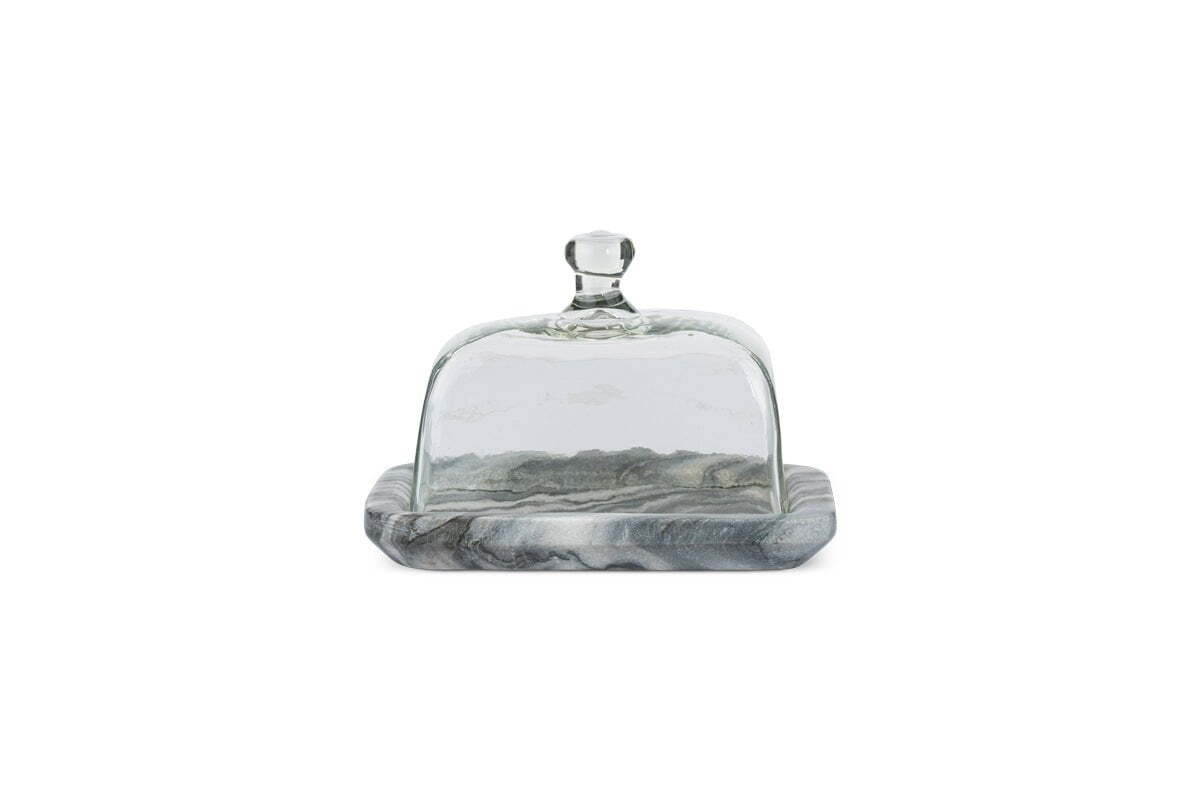 The nkuku Kallso Marble Butter Dish features a smooth, polished rectangular marble base with elegant gray marbling and a recycled clear glass dome lid with a round knob, displayed on a white background.