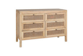 The Kanz Mango Wood Chest Of Drawers by nkuku features six drawers with woven cane panels and round metal knobs, all in solid natural mango wood. Its rectangular frame stands on straight legs for a minimalist, rustic look.
