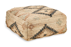 The nkuku Kesu Kilim Pouf - Large is a square, flat pouf with textured beige fabric. Its black, gray, and brown geometric patterns lend a rustic Southwestern vibe—ideal for extra seating or as a cozy footrest.