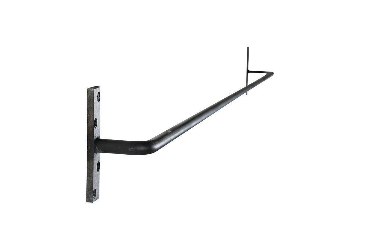 The Laila Hanging Rail - Iron by nkuku features a black metal handrail bracket with a rectangular mounting plate, four screw holes, and a handmade steel rail that extends outward at a right angle to support a long straight bar. Plain white background.