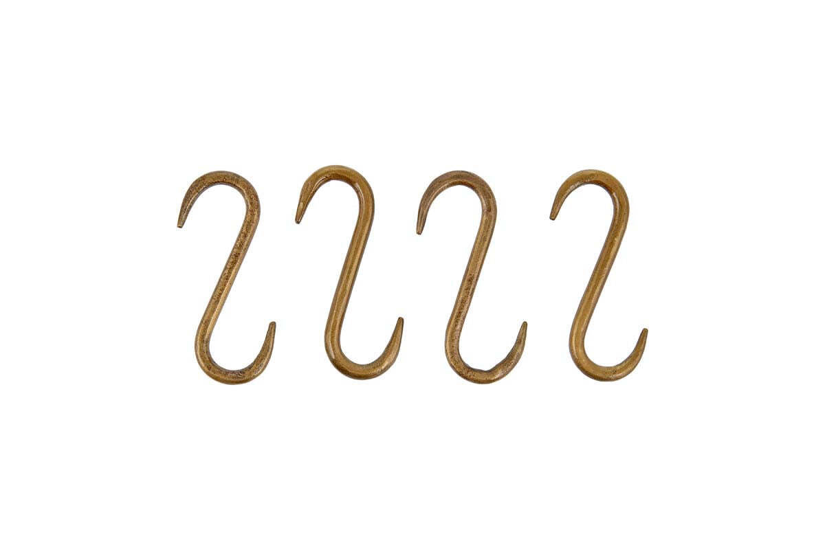 The nkuku Laila Iron S-Hooks in brass, sold as a set of 4, feature a smooth, rounded form and traditional design. Evenly spaced in a row on a white background, they’re ideal for use on iron hanging rails.