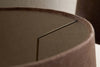 Close-up of the Mendai Velvet & Linen Lampshade in Mocha by nkuku, highlighting the metal frame support and textured fabric interior under soft lighting.