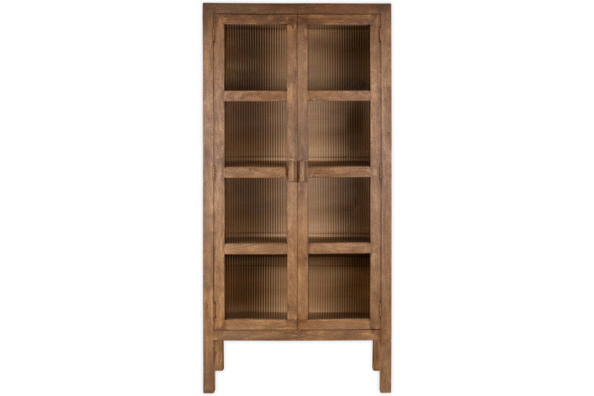 The Mendani Mango Wood & Fluted Glass Cabinet by nkuku features a tall, freestanding design in a walnut stain with two vertically grooved glass doors, simple rectangular lines, four short legs, and multiple shelves visible through the fluted panels.