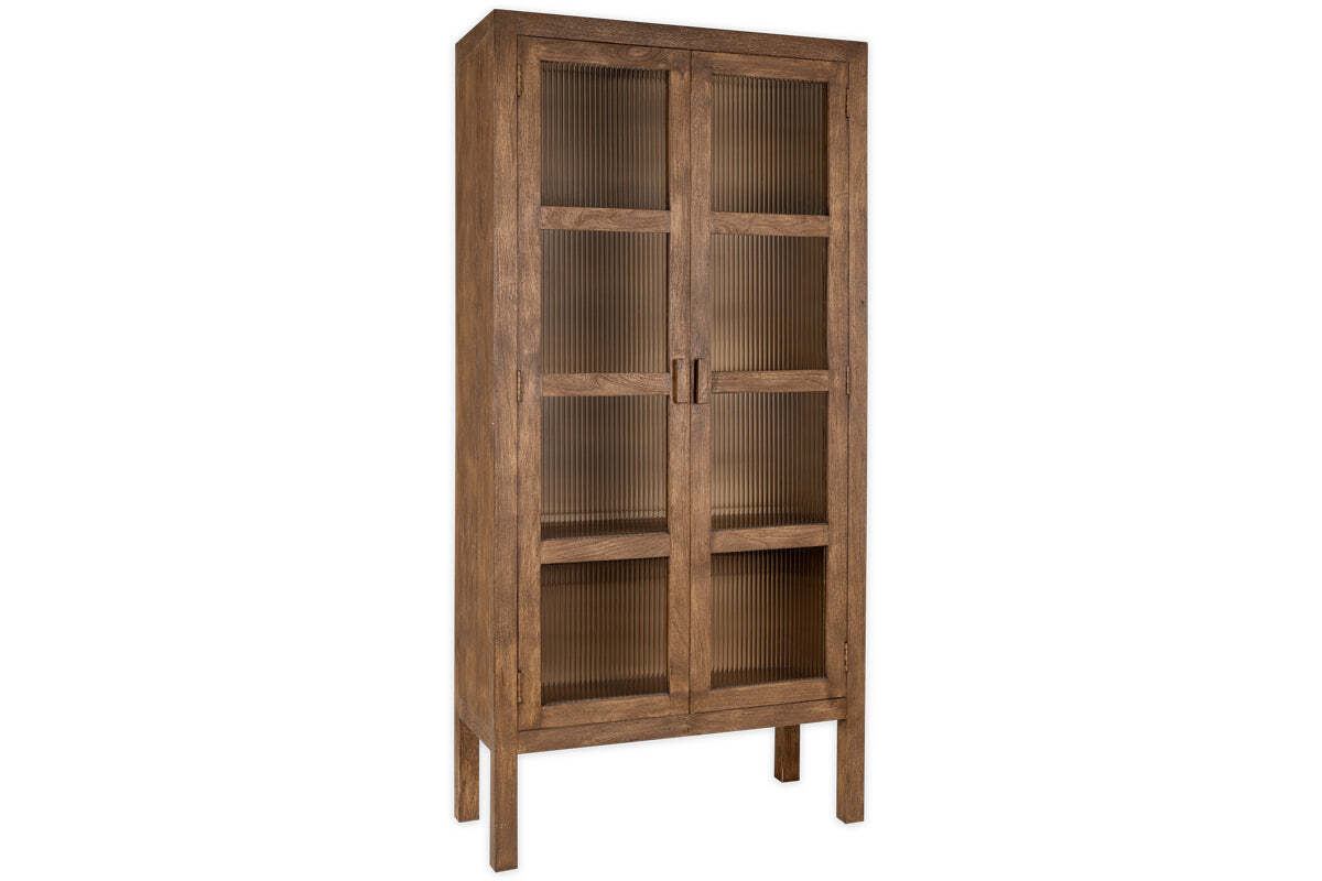 The nkuku Mendani Mango Wood & Fluted Glass Cabinet features four legs, two fluted glass doors, three interior shelves, and simple rectangular handles. Its walnut stain finish highlights the wood grain against a plain white background.
