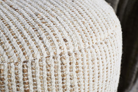 Close-up of the Zairya Jute & Cotton Tall Pouf by nkuku in natural and rust, featuring a textured, woven grid pattern with thick cream, tan, and rust threads—perfect for home decor or as sturdy furniture upholstery.
