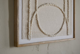 The nkuku Mauri Frayed Wall Art – Neutral features raised ivory fabric and a semicircle on linen, framed in wood for a minimal look. Its soft textures and neutral tones create an elegant accent for any wall.
