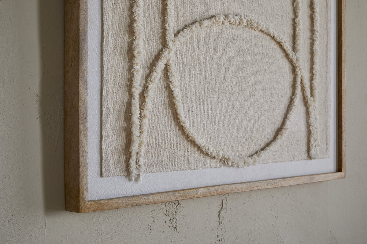 The nkuku Mauri Frayed Wall Art – Neutral features raised ivory fabric and a semicircle on linen, framed in wood for a minimal look. Its soft textures and neutral tones create an elegant accent for any wall.
