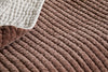 Close-up of the Nidra Velvet & Linen Bed Quilt by nkuku, showing Kantha quilting, a soft rust velvet side, a contrasting off-white linen side, and a wavy ribbed pattern—ideal for King or Super King beds.