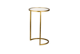 The Nakuru Iron & Glass Side Table Set by nkuku features a slim modern round design with a brass finish and glass top—an elegant addition to any space, perfect for fans of stylish round side tables.