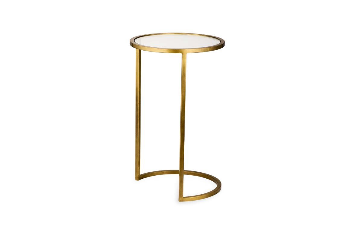 The Nakuru Iron & Glass Side Table Set by nkuku features a slim modern round design with a brass finish and glass top—an elegant addition to any space, perfect for fans of stylish round side tables.