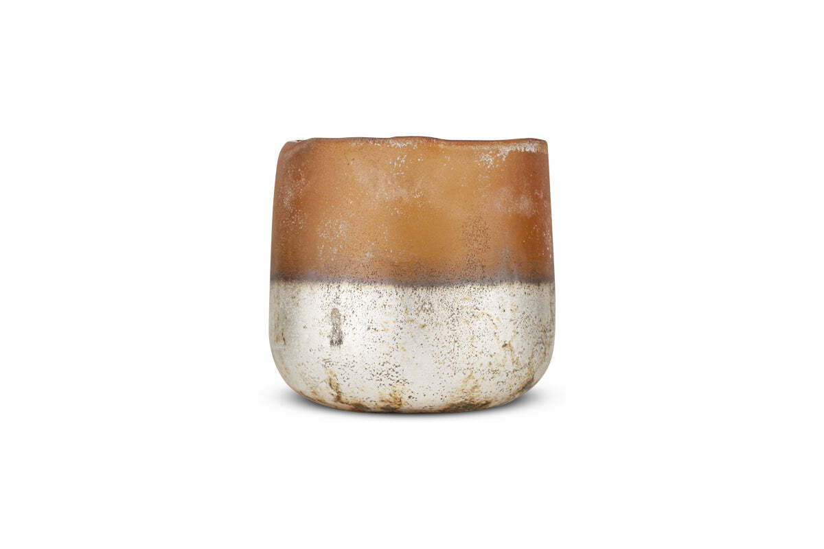 The Ngolo Tealight Holder - Antiqued Amber by nkuku is a small, round ceramic pot with a matte brown top and textured metallic silver base. It features an uneven, wavy rim and rustic, handmade appeal on a plain white background.