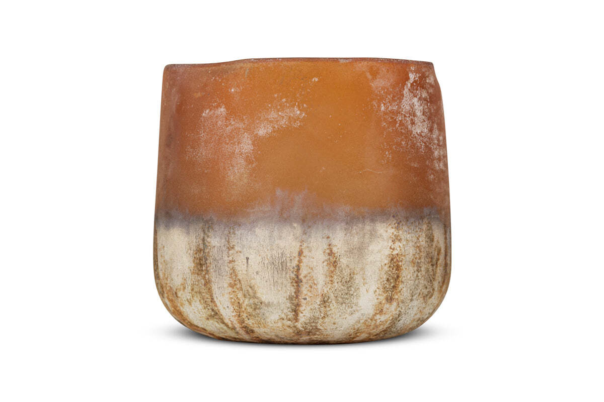 The Ngolo Tealight Holder - Antiqued Amber by nkuku has a rounded, textured ceramic design with a matte finish and a warm amber gradient, giving it an antiqued look. It's set against a plain white background.