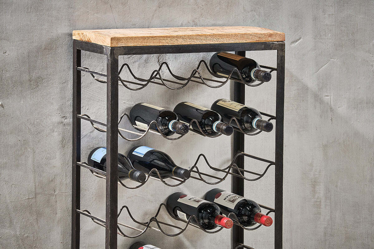 The nkuku Obra Industrial Wine Rack - Mango Wood & Iron - Large features wavy iron shelves and a mango wood top, blending rustic charm and industrial style while elegantly storing wine bottles against any wall.