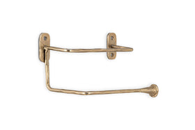 The Olani Toilet Roll Holder by nkuku features antique brass with a textured, handcrafted finish, two mounting plates, and a flared-tip horizontal arm to hold your toilet roll securely. Perfect for adding elegance to any bathroom.