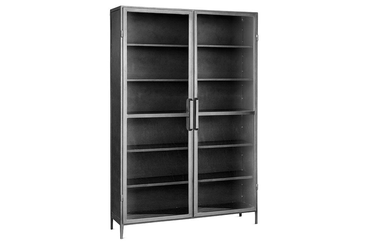 The Takua Iron Cabinet - Wide by nkuku is a tall, freestanding display unit with two glass doors, four adjustable shelves, slim vertical handles, and short legs. Its modern industrial design offers stylish storage with an empty interior.
