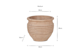 The Ullu Terracotta Planter by nkuku is a medium, round beige terracotta pot with a ridged middle, rustic natural finish, and dimensions: 33cm base width, 26cm opening width, and 28cm height.