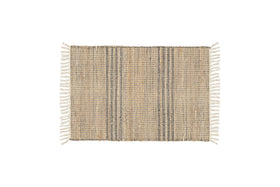 The Varli Jute & Cotton Doormat by nkuku features a handcrafted rectangular design with beige and dark brown vertical stripes, white fringes on the short edges, and is ideal as an indoor entryway mat. Background is plain white.