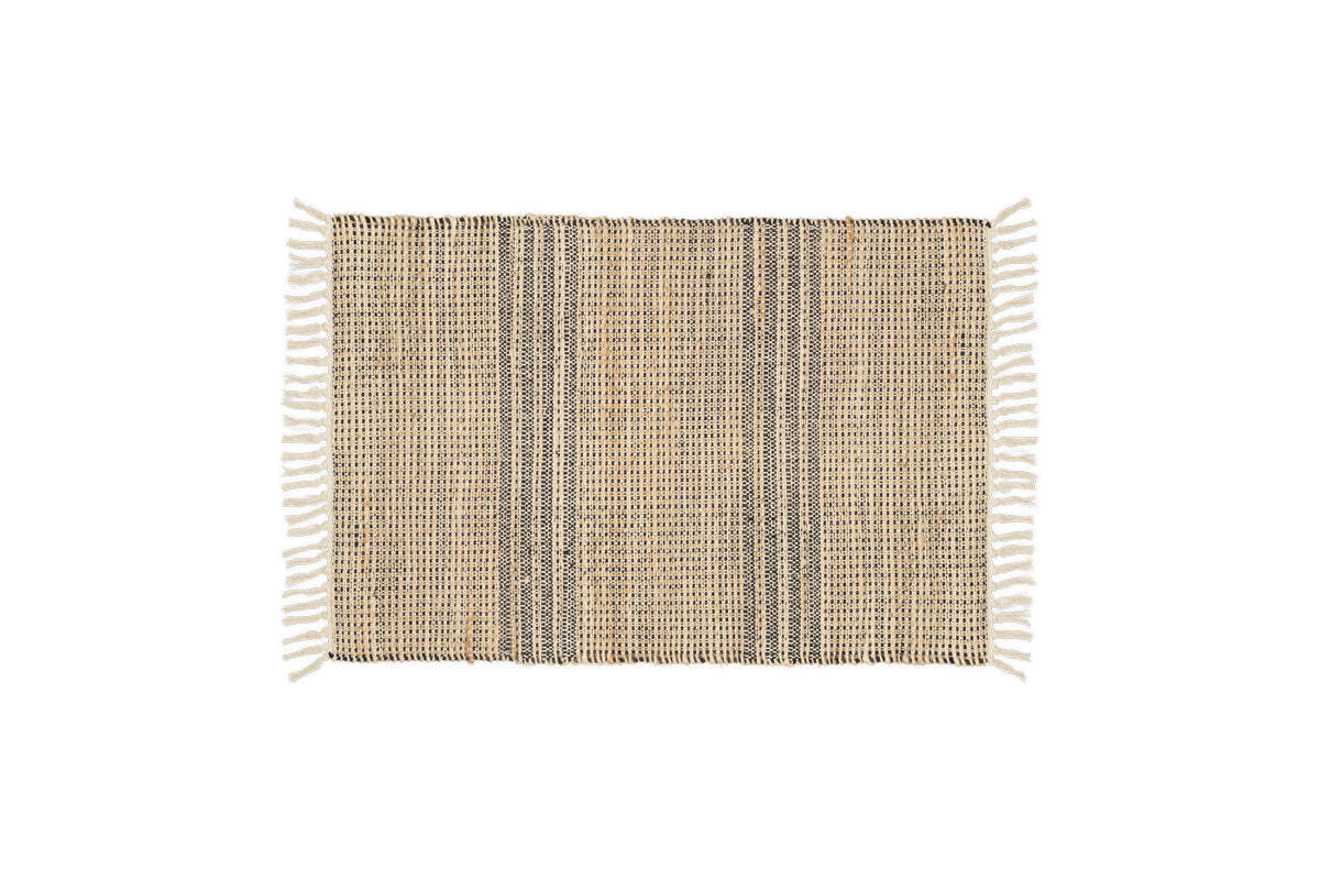 The Varli Jute & Cotton Doormat by nkuku features a handcrafted rectangular design with beige and dark brown vertical stripes, white fringes on the short edges, and is ideal as an indoor entryway mat. Background is plain white.