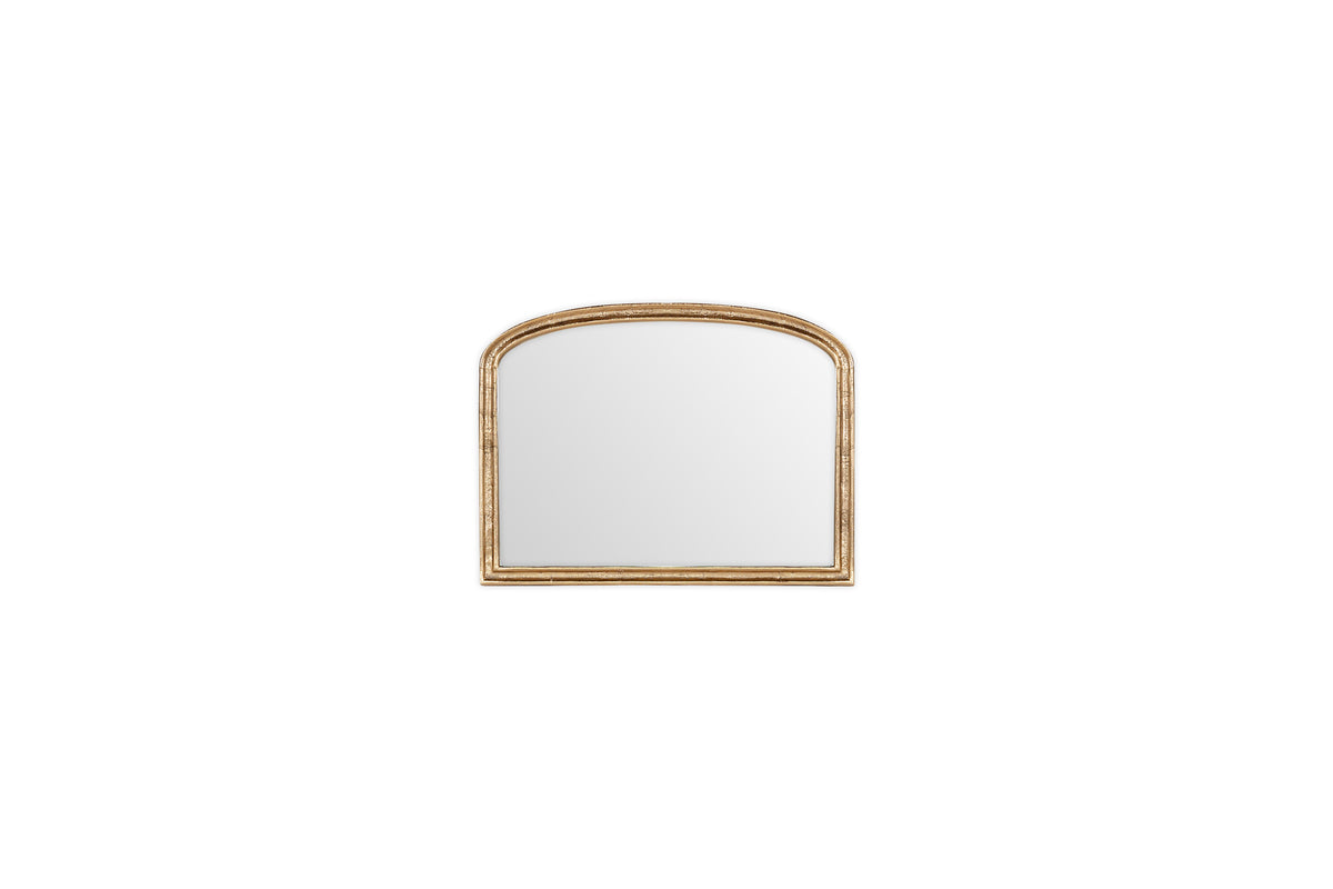 The nkuku Almora Wall Mirror – Antique Brass, Extra Small, has a rectangular shape with an arched top and a slightly distressed gold finish, shown against a plain white background.