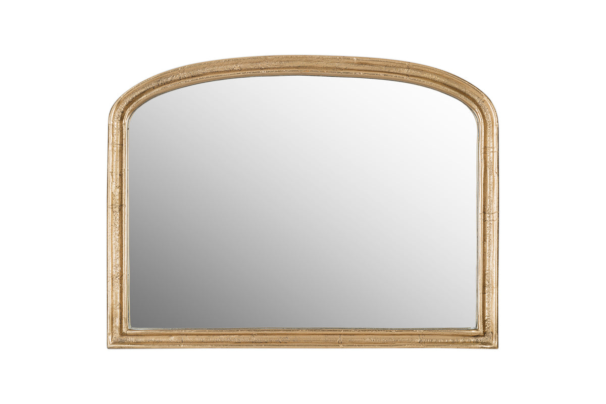 The nkuku Almora Wall Mirror - Extra Small features an antique brass arched frame with a slightly distressed finish, perfect for compact spaces.