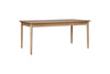The Anbu Mango Dining Table - Natural by nkuku features sturdy legs, a refined finish, and elegant mango wood design.