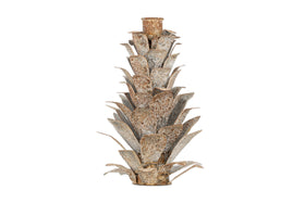 The nkuku Elagalu Pine Cone Candle Holder in zinc features layered, textured leaves fanning outward in tiers and a circular space for a candle at the top—ideal as festive tabletop decor. Background is plain white.