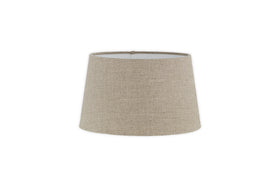 The Embaata Linen Lampshade by nkuku features a natural, textured linen design in beige with a subtly flared cylindrical shape, shown against a plain white background.