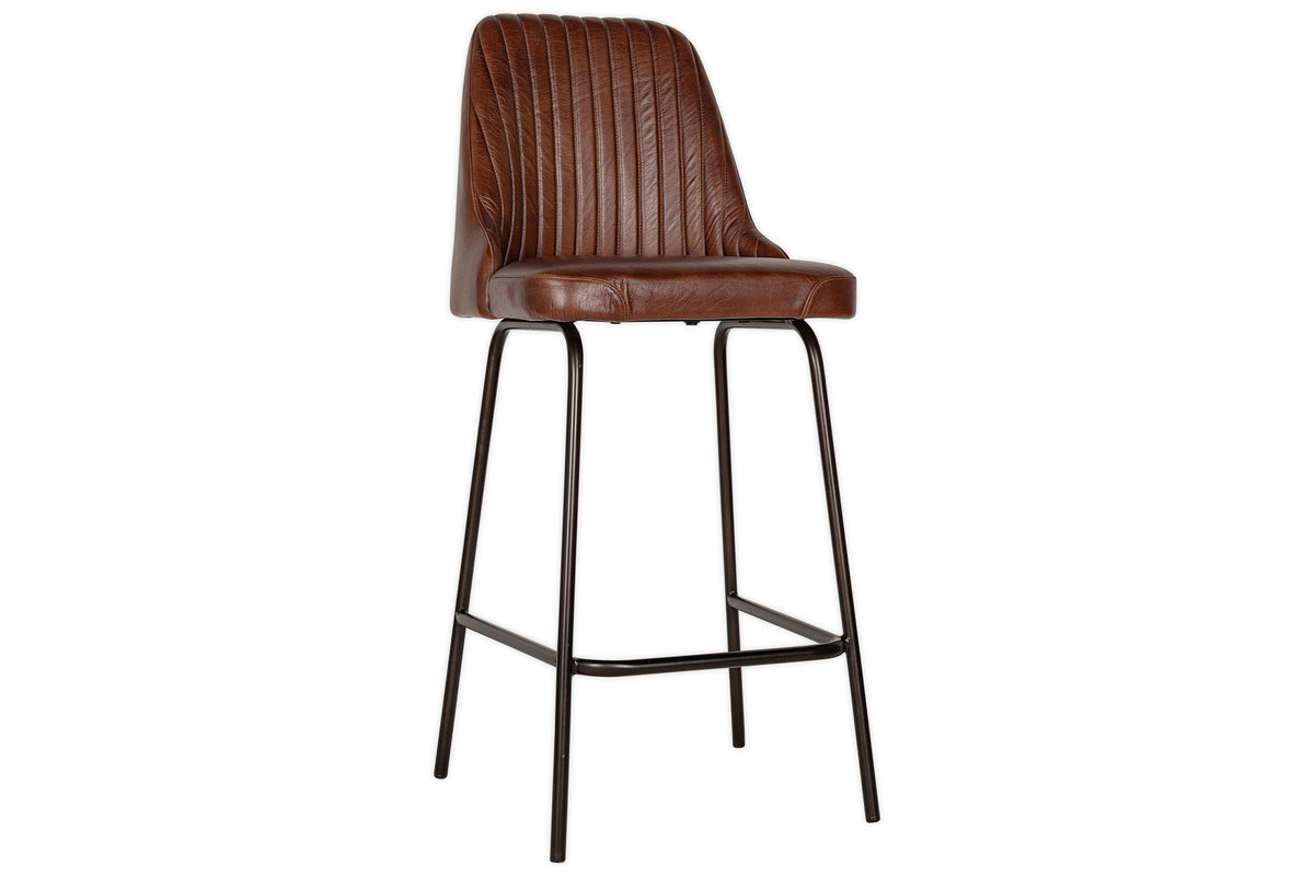 The Harsha Leather Counter Chair by nkuku features a chocolate brown leather seat with a ribbed, cushioned backrest and slim black metal legs—perfect for adding stylish comfort to your kitchen island.