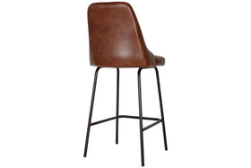 The nkuku Harsha Leather Counter Chair in chocolate brown features a high backrest, black metal legs, and a modern minimalist design. Seen from behind at an angle, its perfect for kitchen island seating.