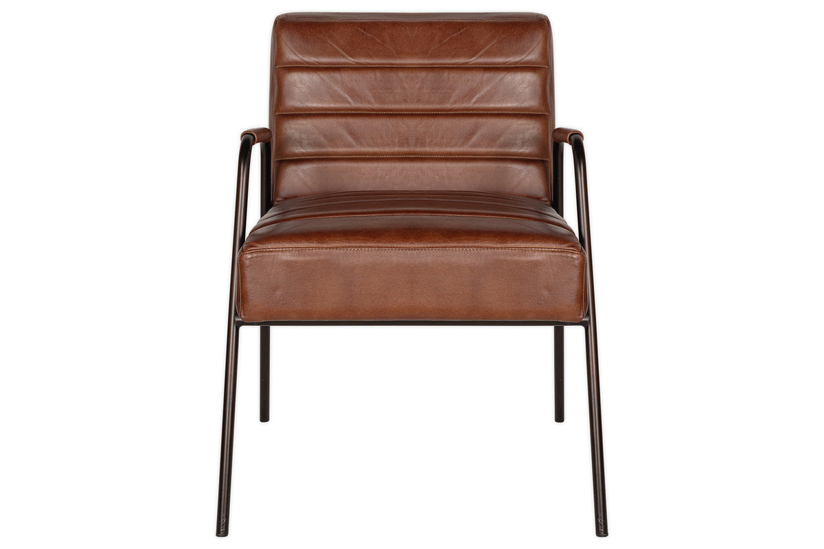 Front view of the nkuku Hadithi Leather Occasional Chair in chocolate brown, featuring a ribbed padded backrest and seat, slim black metal legs, and matching black metal armrests.