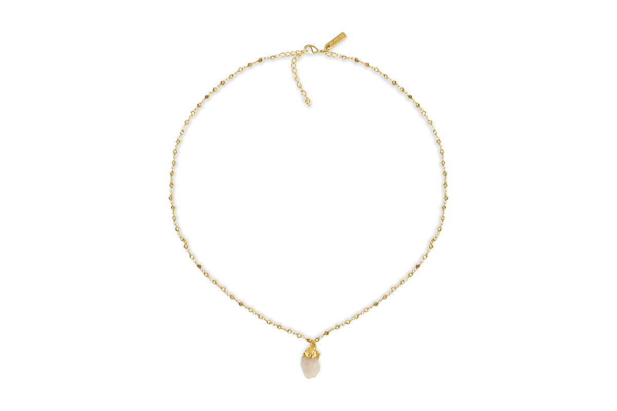 The nkuku Hadari Rose Quartz Necklace in gold features a delicate adjustable chain with a lobster clasp and an elegant oval-shaped rose quartz pendant—perfect for any occasion.